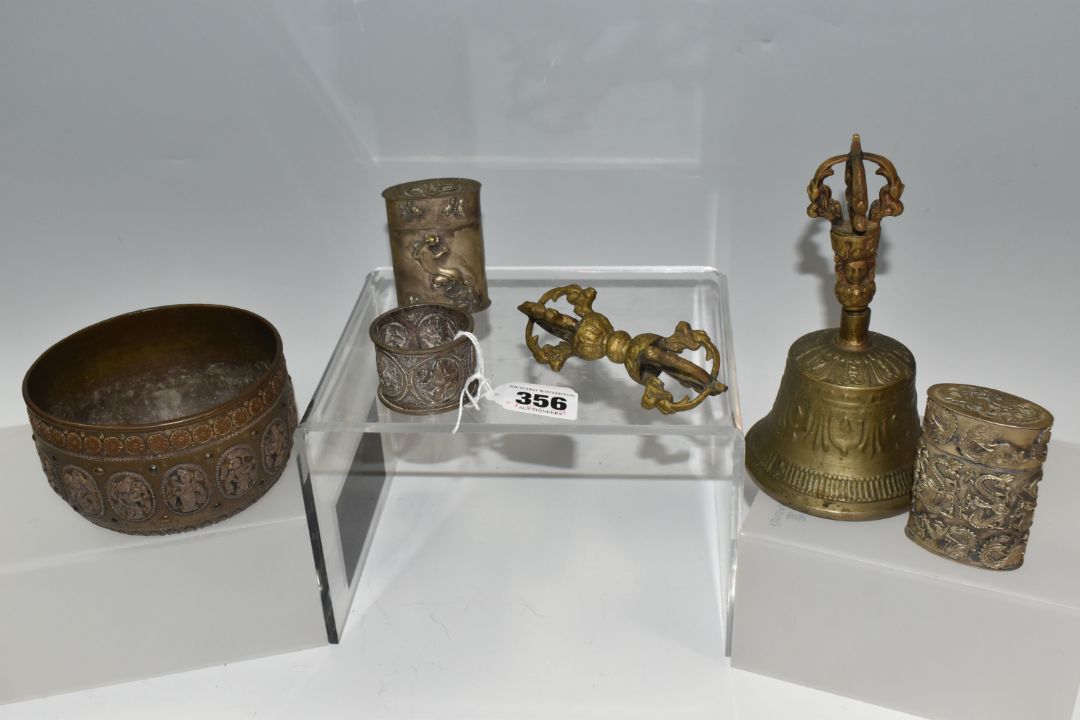 A GROUP OF ASIAN METAL WARE, possibly Tibetan and Indian in origin, comprising a napkin ring - Image 1 of 9