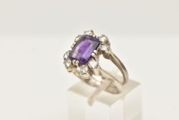A WHITE METAL AMETHYST AND DIAMOND DRESS RING, set with a rectangular amethyst, measuring