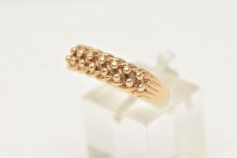 A 9CT YELLOW GOLD KEEPERS RING, hallmarked 9ct gold London 1988, sponsors marks A & Co, ring size