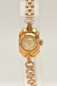 AN ELCO WRISTWATCH, the cream dial, with gilt hourly applied markers, gilt hands, the dial is signed