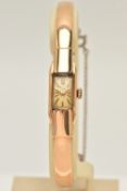 A RETRO REIMAR WRISTWATCH, the rectangular cream dial, with gilt hourly applied markers, plain