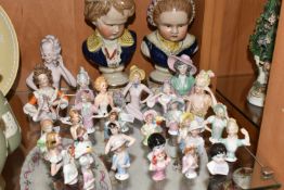 A COLLECTION OF HALF-DOLLS AND TWO 'BOURBON CHILDREN' BUSTS, to include twenty eight half-dolls,