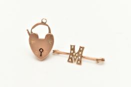 TWO EARLY 20TH CENTURY YELLOW METAL JEWELLERY ITEMS, to include an initial 'M' bar brooch, set