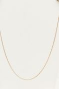 A YELLOW METAL ITALIAN CHAIN, the long, fine 'S' shape link chain with spring clasp, stamped UNO.A.