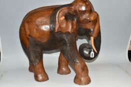 A LARGE HAND CARVED WOODEN ELEPHANT, a carved heavy hard wood elephant, height 50cm x 50cm (1) (