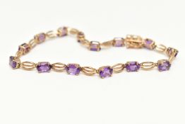 A 9CT GOLD AMETHYST BRACELET, designed as oval amethysts in four claw settings interspaced by oval