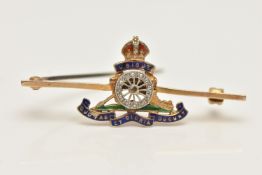 A 9CT GOLD SWEETHEART BROOCH, a yellow gold bar brooch with a Royal Artillery emblem set with rose