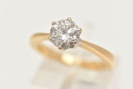 AN 18CT GOLD DIAMOND SINGLE STONE RING, set with a round brilliant cut diamond, in a six claw