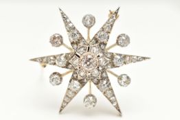 A VICTORIAN DIAMOND SET STAR BROOCH, six pointed star, set centrally with an old cut diamond,