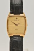 A RAYMOND WEIL WRISTWATCH, the gold coloured face with dot markers, gold coloured hands, textured
