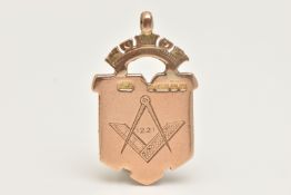 A 9CT GOLD FOB MEDAL, shield design with Masonic detail, hallmarked 9ct Birmingham, approximate
