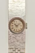 A LADIES 9CT WHITE GOLD 'BUECHE-GIROD' WRISTWATCH, manual wind, round silvered dial signed 'Bueche-