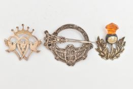 THREE SCOTTISH BROOCHES, to include an orange paste thistle brooch, a silver crowned Lucken booth