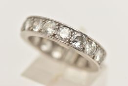 A WHITE METAL DIAMOND FULL ETERNITY RING, set with approximately seventeen round brilliant cut