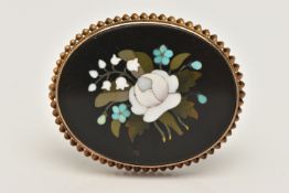 A PIETRA DURA BROOCH, of an oval form depicting flowers, collet set with a rope twist surround,