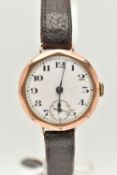 AN EARLY 20TH CENTURY 9CT ROSE GOLD WRISTWATCH, manual wind, round white dial, Arabic numerals,