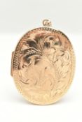 A 9CT GOLD LOCKET, a large yellow gold locket with embossed scrolling acanthus detail, fitted with a