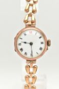 A 9CT GOLD LADIES WRISTWATCH, hand wound movement, round white dial, Roman numerals, rose gold case,