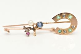 A YELLOW METAL EMERALD AND DIAMOND STICK PIN WITH A YELLOW METAL GEM SET BROOCH, the stick pin