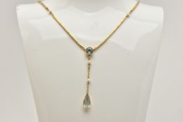 A GEM SET LARIAT NECKLACE, a yellow metal cylinder link chain interspaced with small cultured