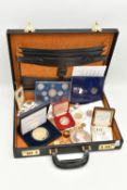 A COMBINATION BRIEFCASE CONTAINING AMOUNTS OF COIN MEDALS and COMMEMORATIVES, to include a proof