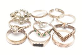 AN ASSORTMENT OF ELEVEN RINGS, to include two silver rings, both with British hallmarks, approximate