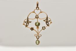 AN EARLY 20TH CENTURY LAVALIER PENDANT, an open work scrolling pendant with foliage detail, set with