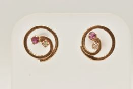 A PAIR OF 9CT GOLD RUBY AND DIAMOND STUD EARRINGS, each of circular outline with central circular