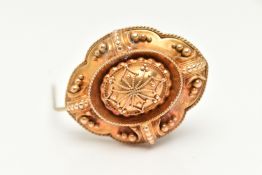 A YELLOW METAL ETRUSCAN MEMORIAL BROOCH, of an oval form, decorated with bead work, vacant