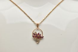 A 9CT GOLD GEM SET PENDANT NECKLACE, the pendant in the form of a flower basket set with marquise