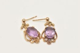 A PAIR OF 9CT GOLD AMETHYST DROP EARRINGS, each designed as an oval amethyst in claw settings to the