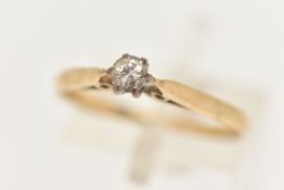 A 9CT YELLOW GOLD DIAMOND SINGLE STONE RING, set with a round brilliant cut diamond, measuring