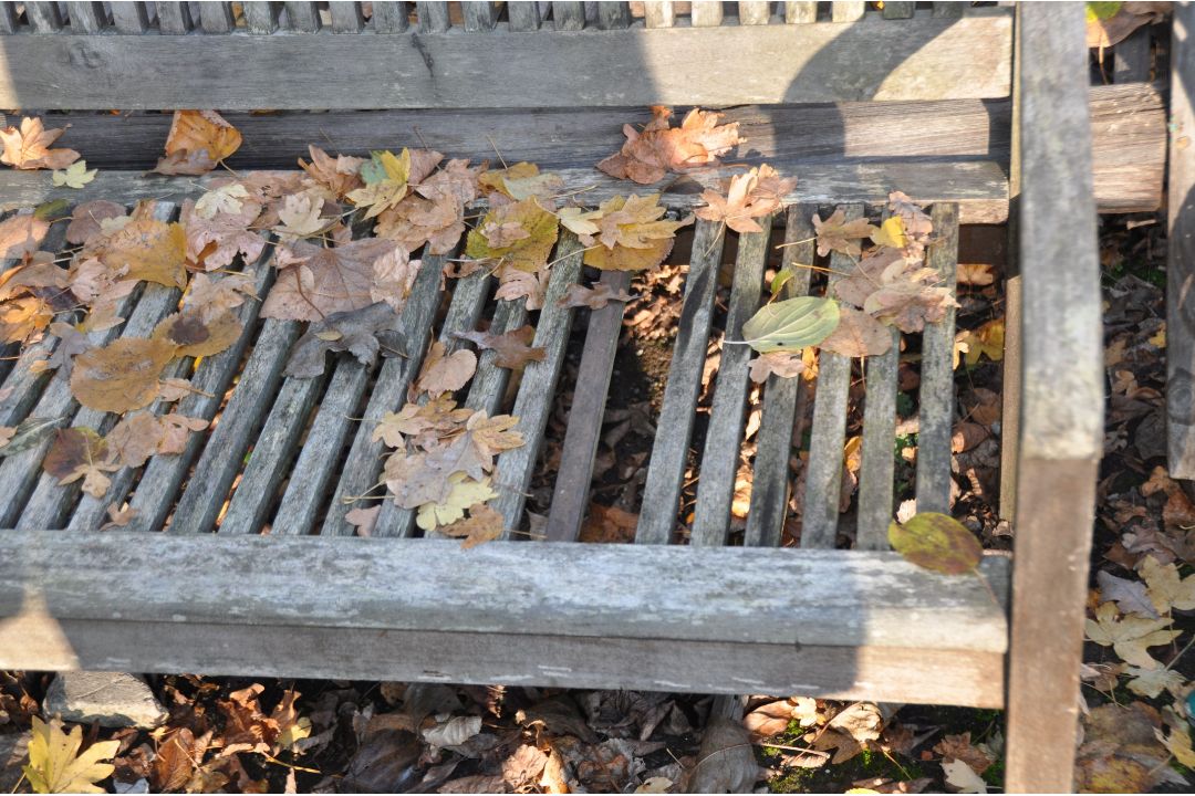 TWO MODERN WEATHERED HARDWOOD GARDEN BENCHES, both with slatted seats and backs, one 120cm wide, the - Image 2 of 4
