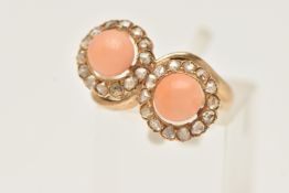 A YELLOW METAL CORAL AND DIAMOND RING, of a cross over design, with two circular clusters each