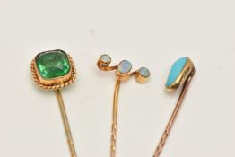 THREE ANTIQUE STICKPINS, to include a three stone opal cabochon stickpin, an oval turquoise cabochon