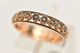 A YELLOW METAL SPLIT PEARL AND ENAMEL FULL ETERNITY RING, set with a row of worn split pearls,