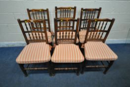 A SET OF SIX EARLY 20TH CENTURY OAK RUSH SEATED CHAIRS (condition report: later cushions, one