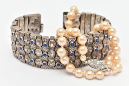 A LARGE WHITE METAL LAPIS LAZULI ARTICULATED BRACELET AND AN IMITATION PEARL NECKLACE, a wide