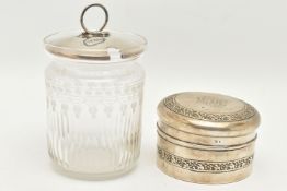 A SILVER BOX AND SILVER LIDDED JAR, a circular form silver box with embossed detail and monogram