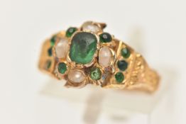 A YELLOW METAL GREEN PASTE AND SPLIT PEARL CLUSTER RING, to the scrolling shoulders and textured