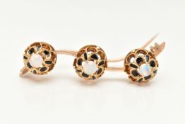 A YELLOW METAL OPAL BROOCH, possible conversion, wavy design set with three open work mounts each