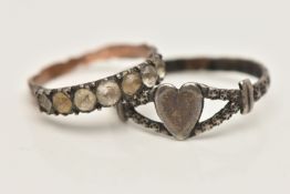 TWO RINGS, the first a white metal heart signet ring, bifurcated shoulders leading onto a textured