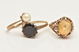 THREE GEM SET RINGS, the first an oval cut Citrine, prong set in a yellow gold brutalist style