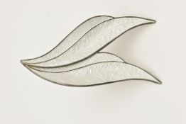 A NORWEIGAN ENAMEL BROOCH, designed as two leaves, white guilloche enamel detail, approximate length