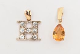 TWO YELLOW METAL PENDANTS, the first a pear cut Citrine pendant, the claw setting fitted with a