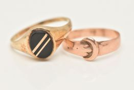 A GENTS 9CT GOLD SINGET RING AND A ROSE METAL BUCKLE RING, the signet of an oval form set with an