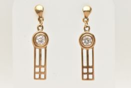 A PAIR OF YELLOW METAL CUBIC ZIRCONIA SET DROP EARRINGS, each open work drop earring set with a