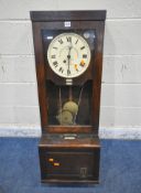 THE GLEDHILL-BROOK TIME RECORDERS LIMITED, an early 20th century oak cased clocking in machine,