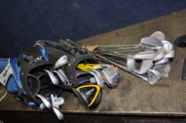 TWO GOLF BAGS CONTAINING CLUBS by Wilson, MD Junior, North Western, Ben Sayer, etc