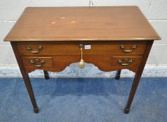 A VICTORIAN MAHOGANY LOWBOY, fitted with one long drawer, above two short drawers, with a wavy front
